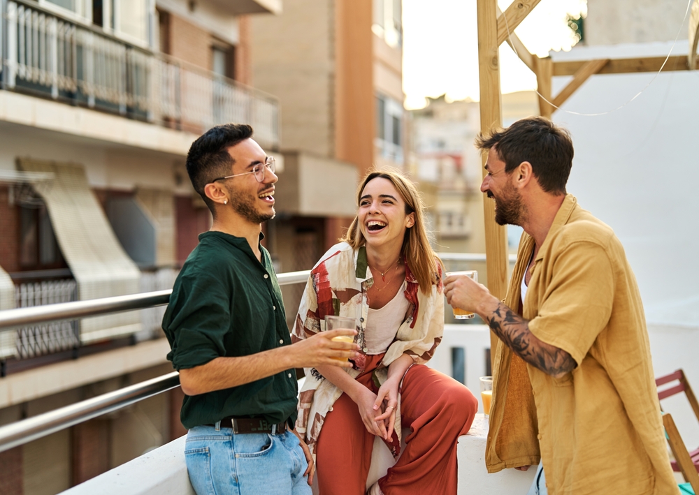 young people having fun at rooftop party